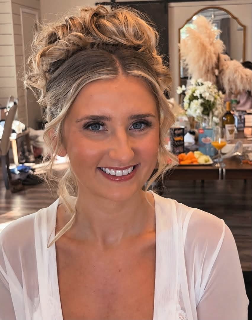 Soft rosy makeup with a romantic updo