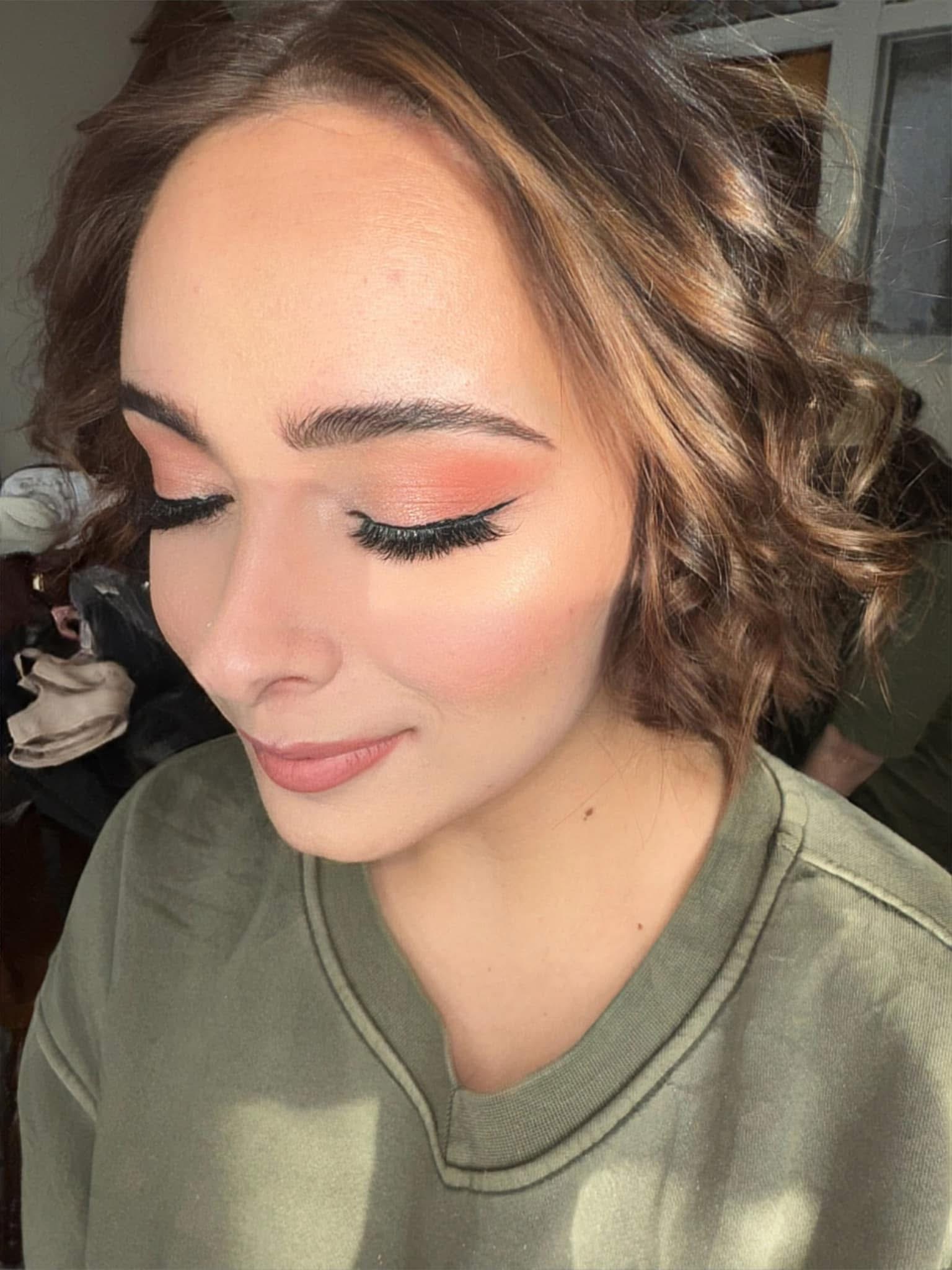 Natural soft makeup with golden shimmer
