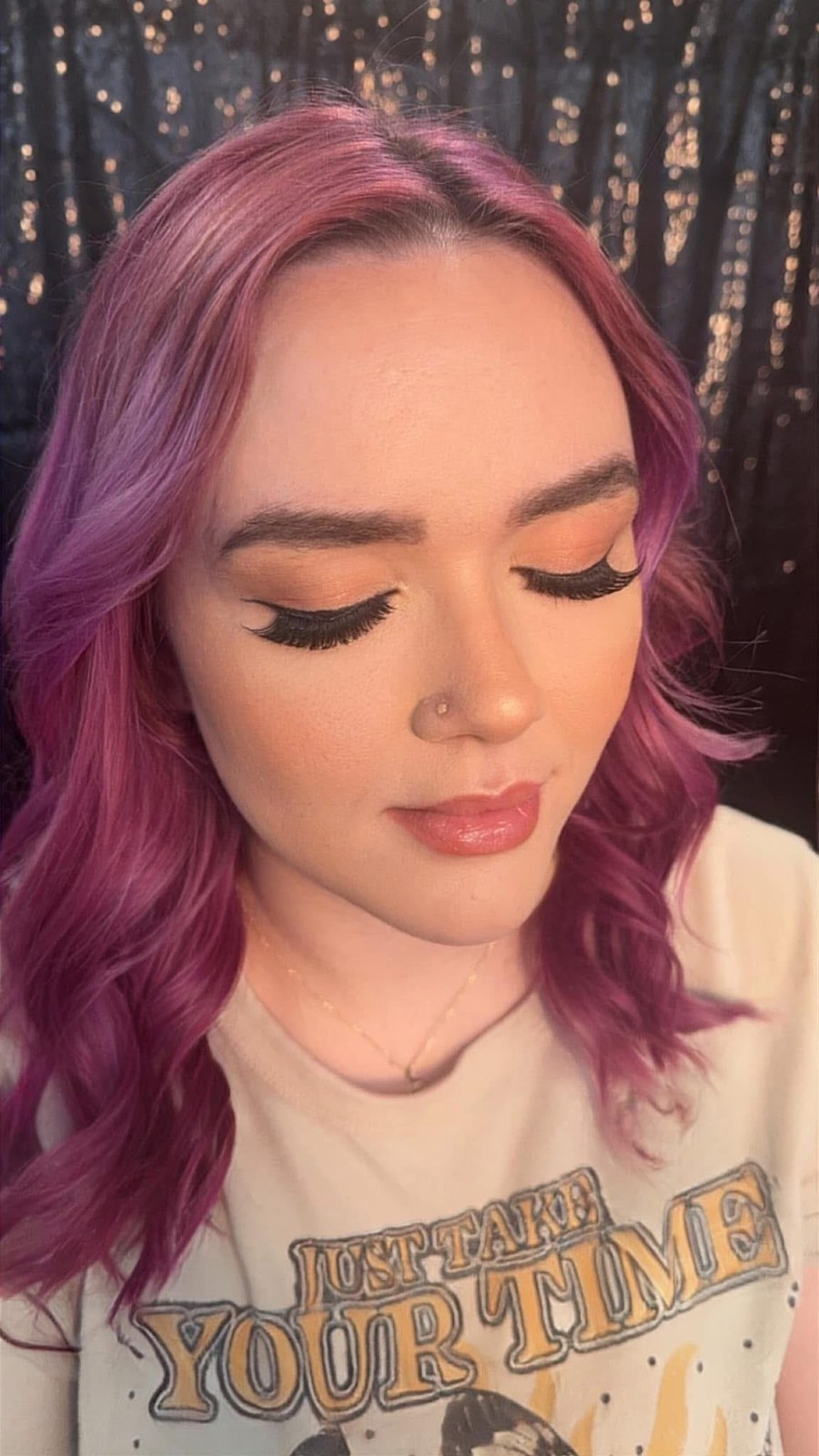 Full glam with defined eyes, lashes, and a rosy lip